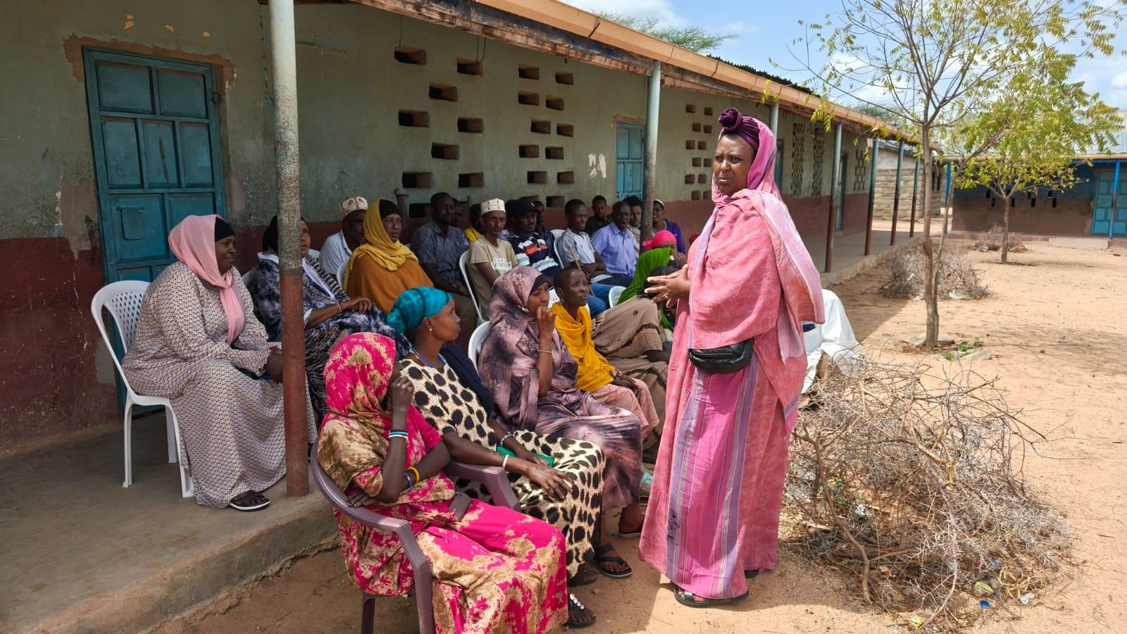 Rose Orguba addressing a community gathering in Laisamis