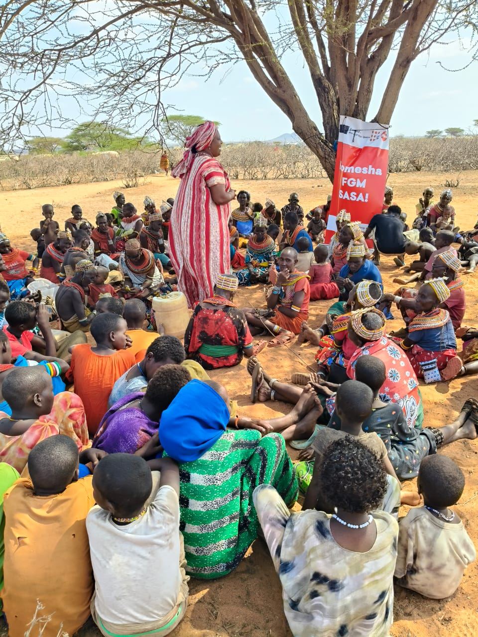 Komesha FGM Sasa campaign event with ActionAid and UNFPA partnership visible
